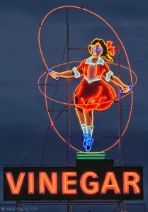 Details: Camera: Canon EOS 5D Mk II Lens: Canon EF 70-200mm f/2.8L IS USM Exposure: 3 exposures (-2,0,+2 EV) Aperture: f/18 Focal Length: 190mm ISO Speed: 100 Accessories: Manfrotto 190XB Tripod, Manfrotto 322RC2 Heavy Duty Grip Ball Head, Canon RC1 Wireless Remote Date and Time: 16 January 2010 8.57pm Post Processing: Imported into Lightroom Exported 3 exposures to Photomatix Tonemap generated HDR using detail enhancer option Opened HDR in CS3 Contrast adjustment Unsharp mask filter Imported into Lightroom Cropped in Lightroom Added keyword metadata Exported as JPEG From Wikipedia: The Skipping Girl Sign or Skipping Girl Vinegar Sign, originally known as Little Audrey, is possibly the first animated neon sign in Australia, located in Victoria Street in the inner Melbourne suburb of Abbotsford. The sign is a painted metal structure depicting a little girl skipping rope. At night it is outlined in neon, and the rope lights up in four positions in sequence giving the appearance of skipping. It was erected at the Nycander factory on 627 Victoria Street in 1936 to advertise their "Skipping Girl" brand of vinegar, and was immediately popular, and became a well loved landmark. The sign was removed in 1968 when the factory was demolished, and following a public outcry, a smaller version was built in 1970 and placed on the roof of the 1930s Crusader Plate factory nearby at 651 Victoria Street. The 1970 version was listed by the National Trust (Victoria) in 2000, about the same time the sign ceased operating. In May 2008, an appeal was launched for public donations to restore the sign by AGL, the National Trust (Victoria), the Heritage Council of Victoria, the Melbourne Restoration Fund, 'Friends of Audrey', the public and the Skipping Girl owners representative, Spring & Parks Pty Ltd.